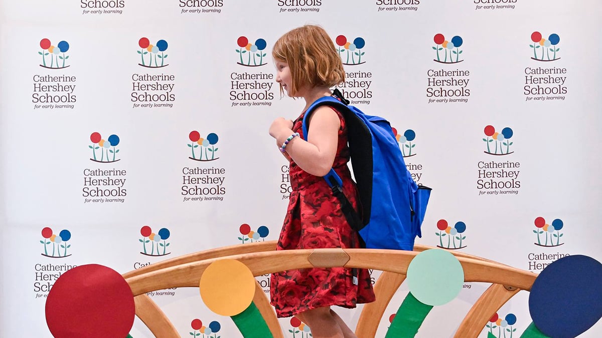 Child crossing a bridge